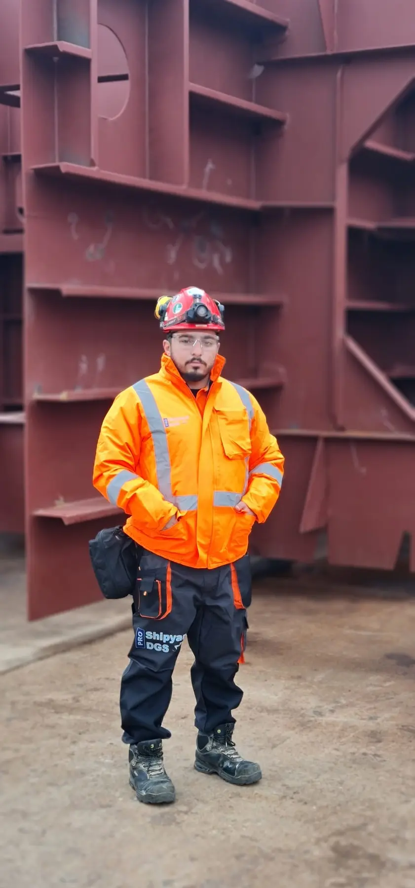 Ercem Aslan at a shipyard steel-block worksite